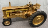 1/16 2 Cylinder tractor, gold in color, no box