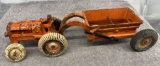 Arcade Allis-Chalmers tractor with dump trailer with man, man missing head, Approx. 12 ½”