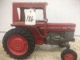 1/16 Massey-Ferguson 1080 diesel tractor, has paint chips, no box