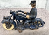 Cast Iron Champion motorcycle with man, tires are weather checked, Approx. 7”