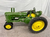 1/16 John Deere 2 Cylinder tractor, metal rims, has paint chips, no box