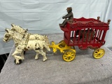Cast Iron Overland Circus animal trailer with man and team of horses,