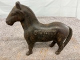 Cast Iron Beauty horse bank, Approx. 5”