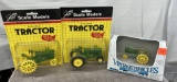 (3) 1/43 John Deere A tractors, all different, new in packages, $x3
