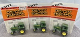 (3) 1/64 John Deere tractors with cabs, new in bubbles, $x3