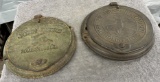 (2) Cast Iron planter box lids, 1 John Deere and 1 Deere and Mansur Company, one money