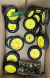 Tractor wheels, some with metal rims