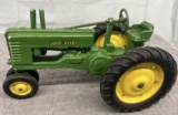1/16 John Deere 2 Cylinder tractor, pressed steel rims, paint chips, no box