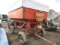 442. 259-702, J&M Gravity Box on MN 9 Ton 4 Wheel Wagon, 12 FT. Fertilizer