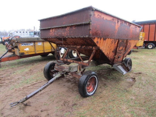 1749. Older MN Gravity Box on Four Wheel Wagon