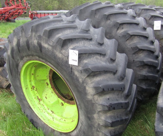 1948. Pair of 23.1 X 34 Inch Tires on Steiger Rims with Attached Band Dual,