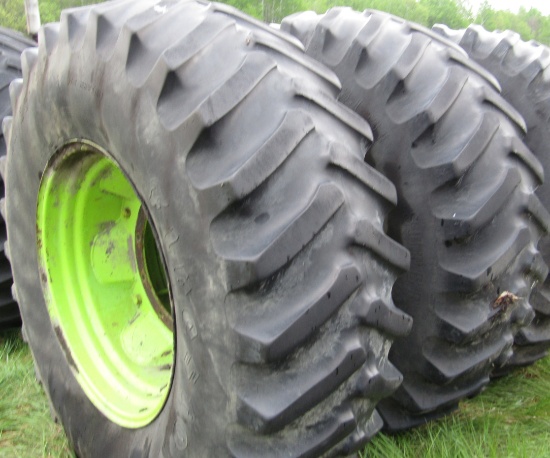 1949.Pair of   23.1 X 34 Inch Tires on Steiger Rims with Attached Band Dual