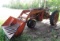 989. Farmall M Tractor with Trip Bucket Loader, Manure Bucket and Snow Exte