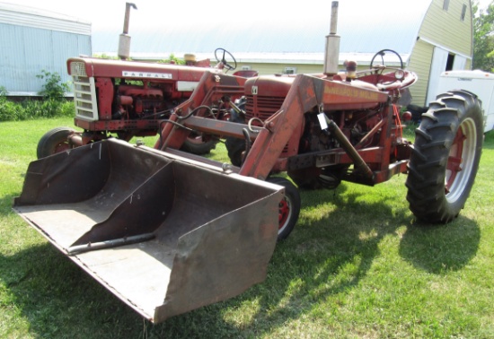 986. 1953 Farmall Super M Tractor, 12 Volt System, Very Good 14.9 X 38 Inch