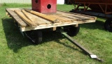 976. 8 X 12 FT. Wooden Flat Rack on 4 Wheel Wagon