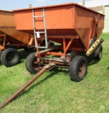979. 160 Bushel +/- Gravity Box on Four Wheel Wagon