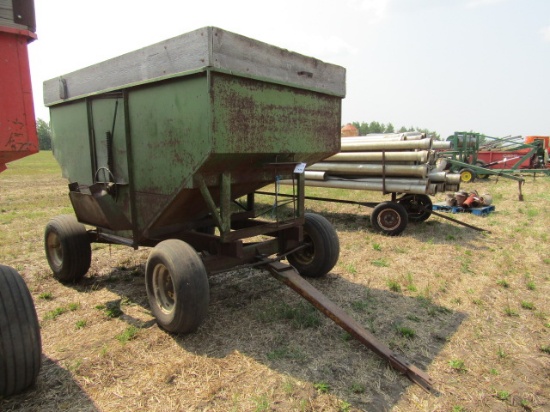 816. 200 Bushel Gravity Box, Wood Extensions on Factory 4 Wheel Wagon