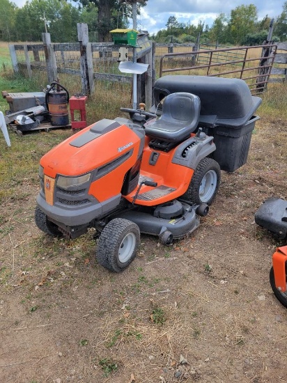 238. HUSQVARNA 24 H.P. HYDROSTATIC LAWN TRACTOR, 48 INCH DECK, BAGGER, SHOW