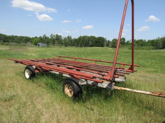 239. 10 FT. X 16 FT. STEEL ROUND BALE RACK ON HD FOUR WHEEL WAGON, EXT. POL