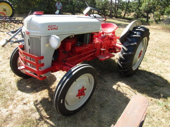 248. VERY NICE FORD MODEL 8N GAS TRACTOR, LIKE NEW 11.2 X 28 INCH REAR TIRE