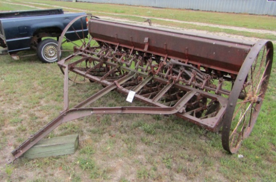 610. McCORMICK DEERING 8 FT. SINGLE DISC GRAIN DRILL, GROUND LIFT