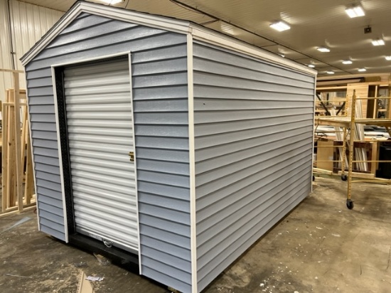 24. 8’ x 12’ Storage Shed With 4’ Rollup Door,