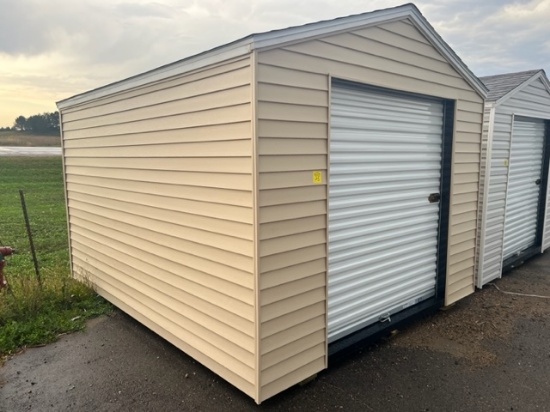 25. 10’ x 12’ Storage Shed With 6’ Rollup Door
