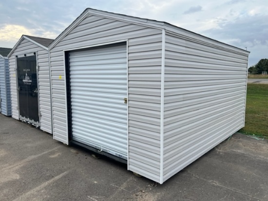 31. 10’ x 14’ Storage Shed With 6’ Rollup Door