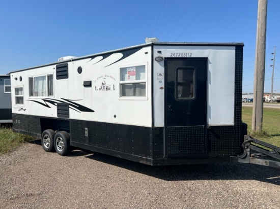 40. 2017 8’ X 22’ V American Surplus Red Lake Edition Ice Castle Fish House, on HYD Tandem Axle