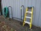 1048. FIRE WOOD HOLDER, 4 FT. FIBERGLASS STEP LADDER, GARDEN HOSE