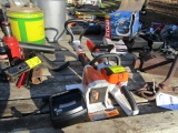 1023. STIHL MSA 140-C CORDLESS CHAIN SAW AND STILH FSA 57 CORDLESS WEED TRI