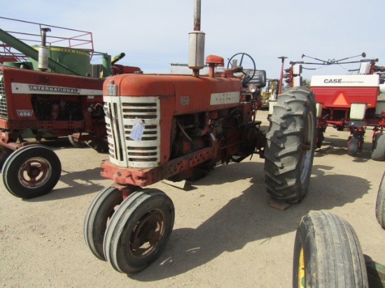 416. 415-1179, IH 450 GAS TRACTOR, NF, 16.9 X 38 TIRES, TA, TAX / SIGN ST3