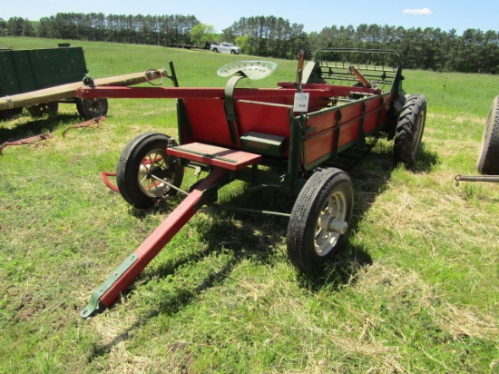 216. BELIVED TO BE A MINNESOTA FOUR WHEEL MANURE SPREADER ON RUBBER, WITH T