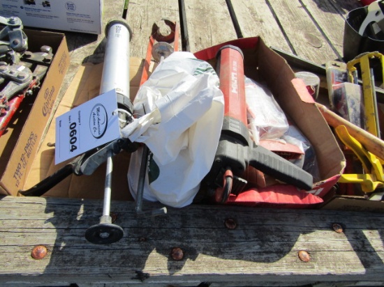 604. HILTI MD 2500 CAULK GUN AND COMPOUND, HATCHET, MALLET, MISC.