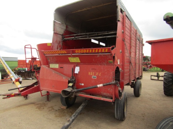 880. 289-716. H&S LOAD MASTER 14 FT. FORAGE BOX ON MN 10 TON 4 WHEEL WAGON,