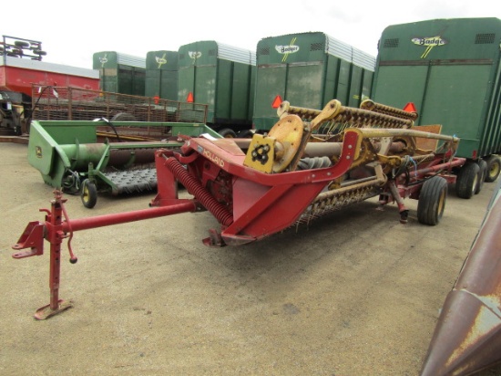 891. 297-682. NEW HOLLAND 495 12 FT. HAYBINE, END TRANSPORT, TAX / SIGN ST3