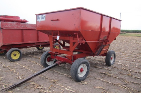 1218. NUBILT 275 BUSHEL +/- GRAVITY BOX ON MN SUPER 6 FOUR WHEEL WAGON