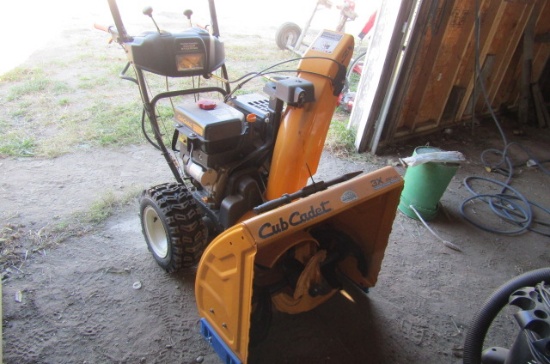 1293. CUB CADET CX 28 INCH WALK BEHIND SELF PROPELLED SNOWBLOWER, HONDA 357