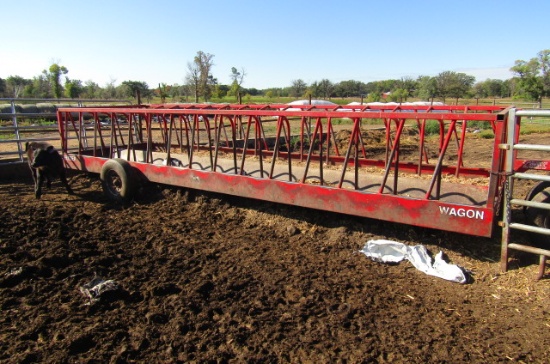 1310. 24 FT. TRI-CYCLE FRONT BUNK FEEDER WAGON