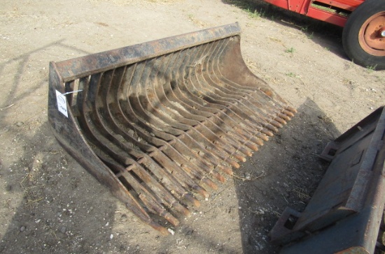 1312. 69 INCH SKID LOADER MOUNTED SKELETON STYLE ROCK BUCKET