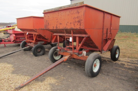 1362. FARM KING 175 BUSHEL +/- GRAVITY BOX ON FOUR WHEEL WAGON