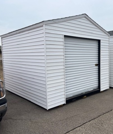 1970. 10’ x 12 Storage Sheds with 6’ Rollup Door, White in Color