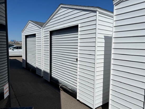 1971. 10’ x 12 Storage Sheds with 6’ Rollup Door, White in Color