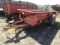 1308. NEW HOLLAND MODEL 320 SINGLE AXLE MANURE SPREADER