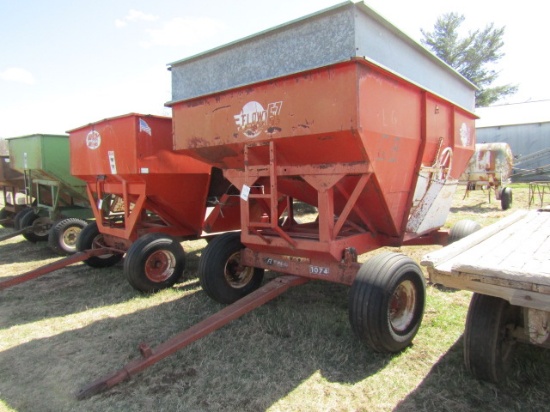 1303. EZ FLOW 300 BUSHEL GRAVITY BOX ON EZ TRAIL 10 TON FOUR WHEEL WAGON, E