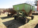 1305. HUSKY MODEL 250 GRAVITY BOX ON HARMS FOUR WHEEL WAGON