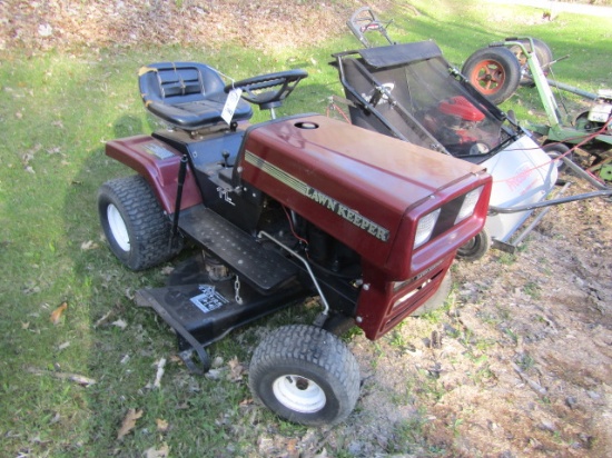 1463. LAWN KEEPER 11 H.P. RIDING LAWN MOWER,  38 INCH DECK, STORED INSIDE,
