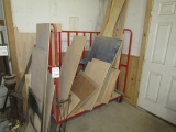 1546. LUMBER RACK ON ROLLERS WITH SOME MISC. LUMBER