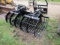 1678. NOTCH 74 INCH SKELETON STYLE ROCK BUCKET WITH DOUBLE CYLINDER HYDRAUL