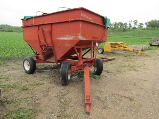 1639. APPROX. 275 BUSHEL GRAVITY BOX WITH TARP HOOPS ON 4 WHEEL WAGON